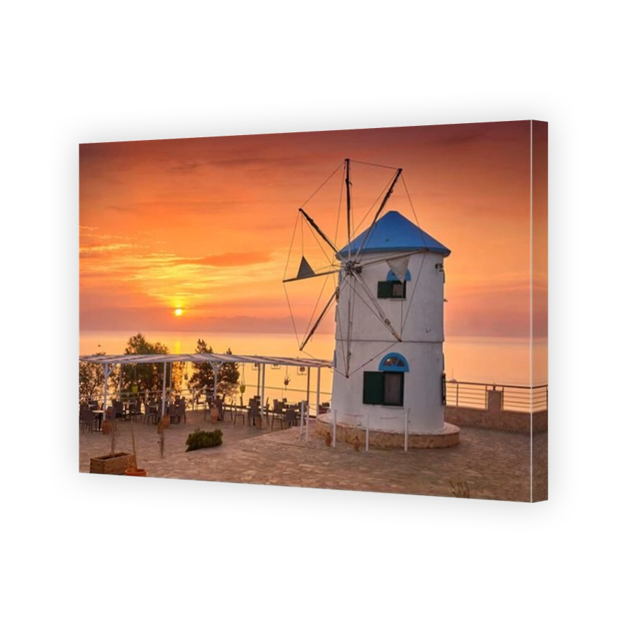 Traditional white windmill at sunrise, Cape Skinari, Zakynthos Island, Greece