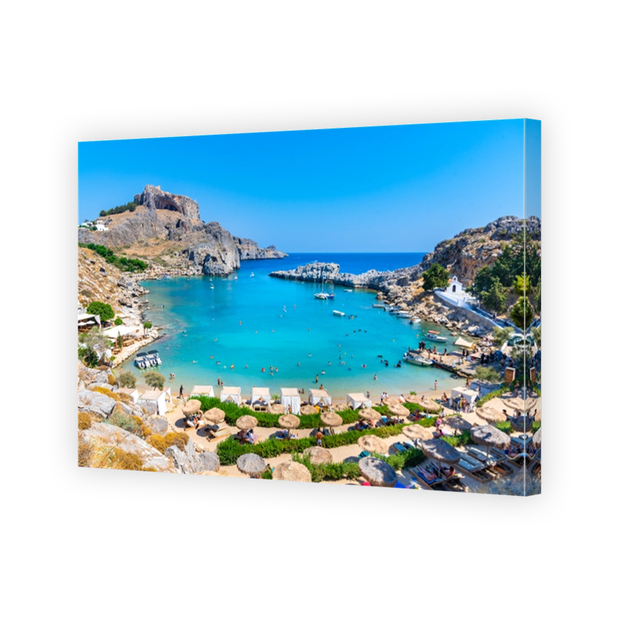 Panoramic view of St. Paul bay with acropolis of Lindos in background, Rhodes island, Greece