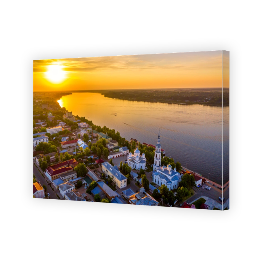 Aerial drone view of Kineshma ancient city with Volga river in Ivanovo region, Russia. Summer sunny day sunset