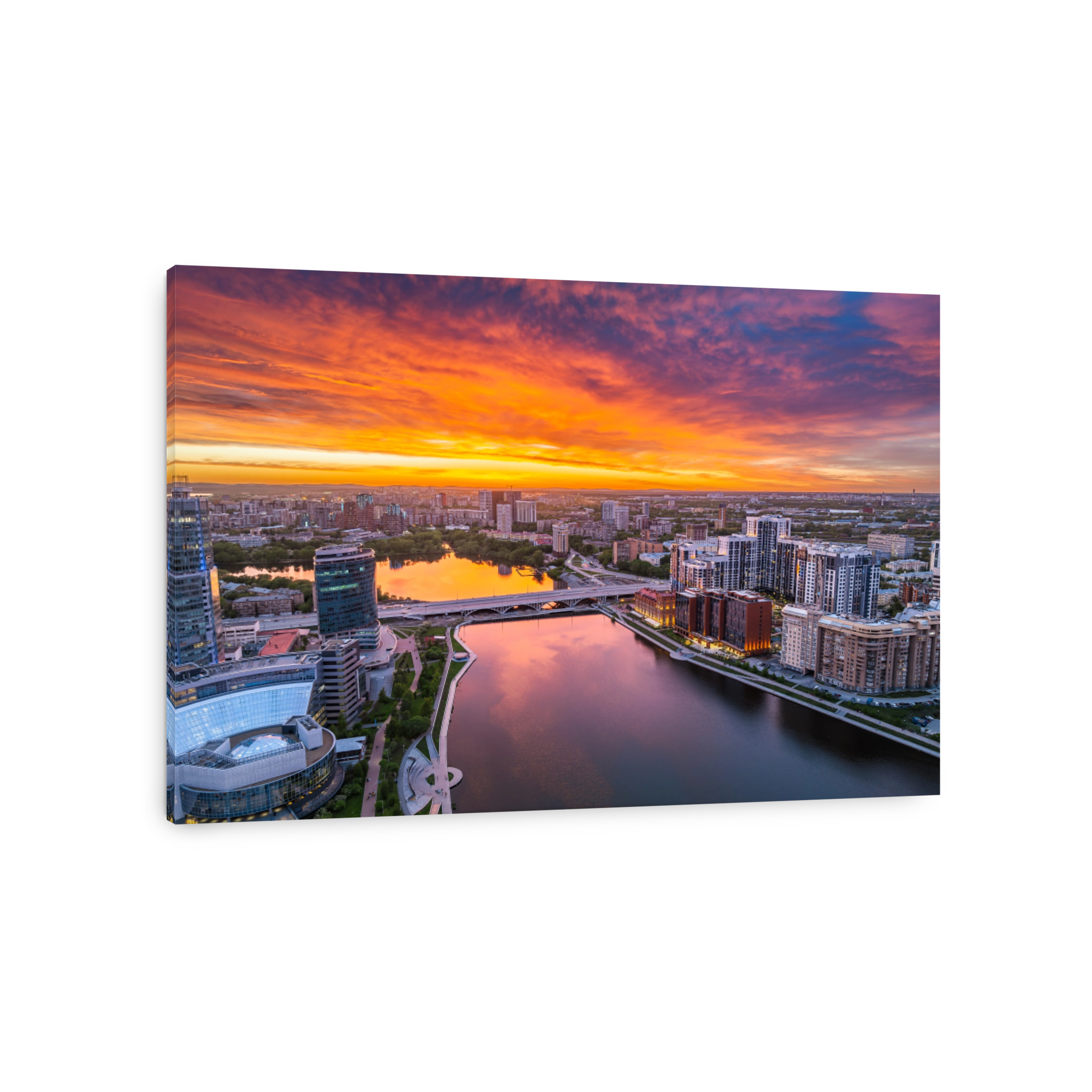 Yekaterinburg city and pond aerial panoramic view at summer sunset.