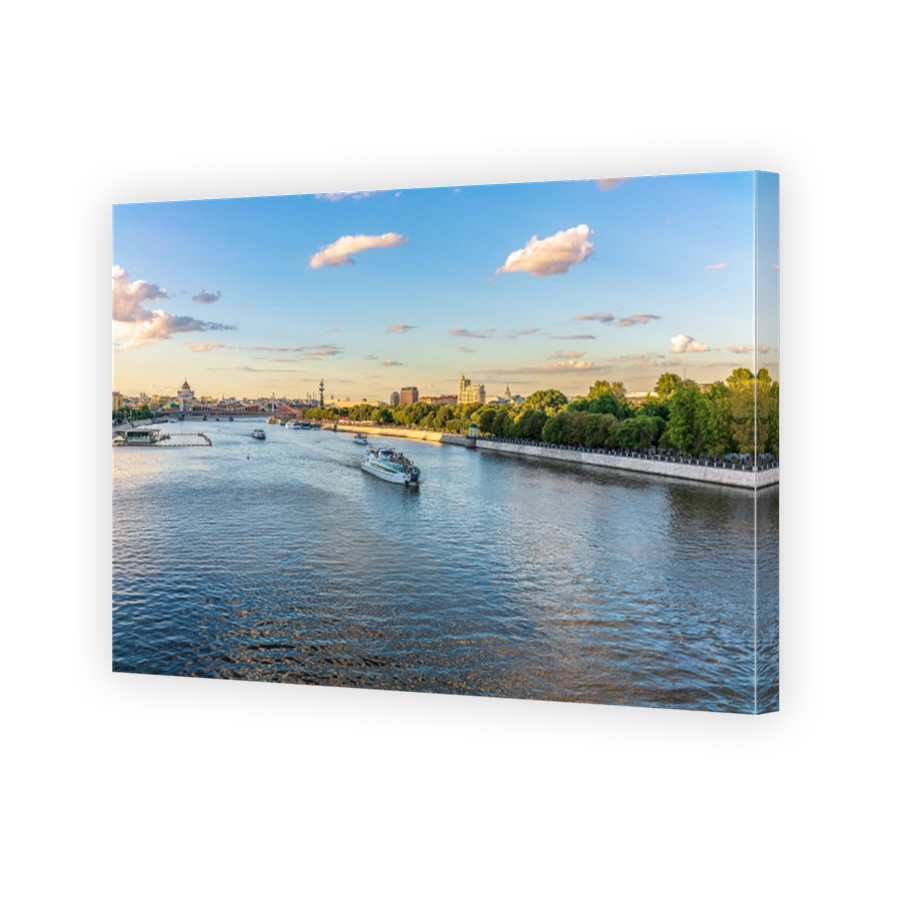 Cruise ship sails on the Moscow river in Moscow city center, popular place for walking.