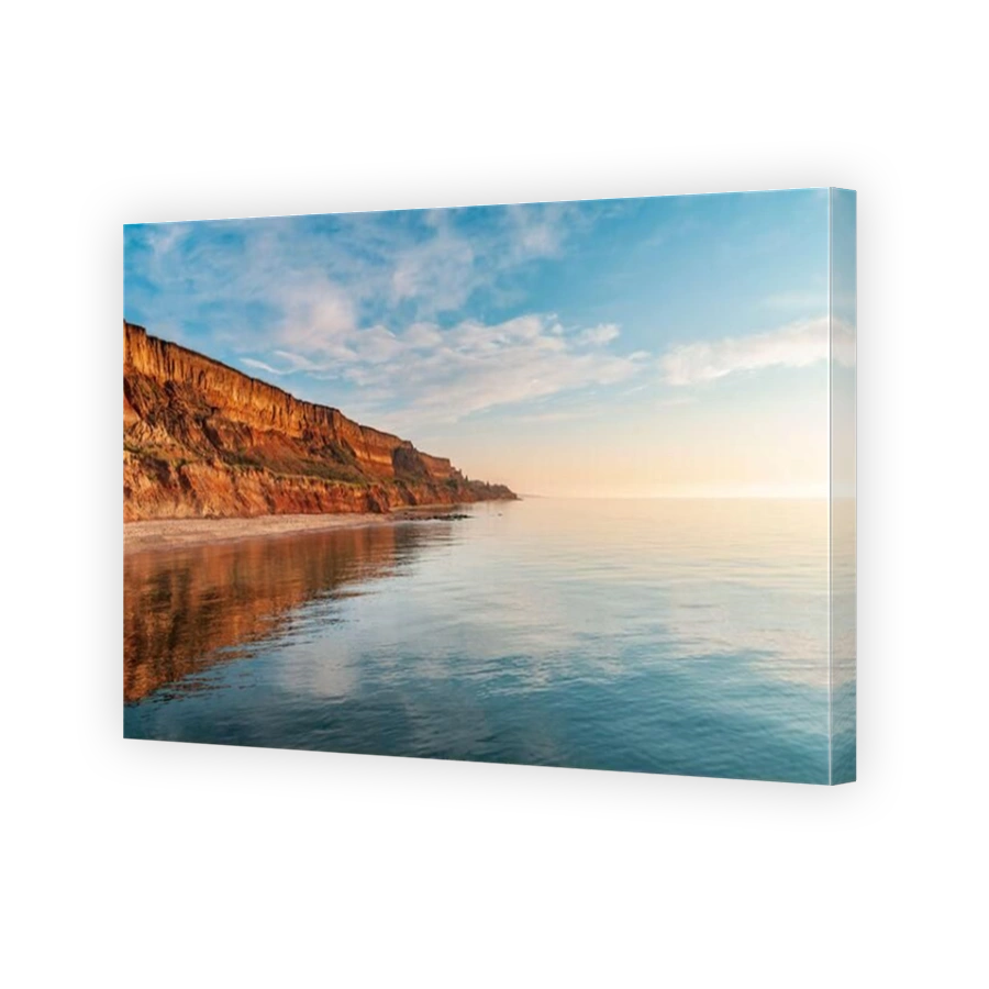 Colorful sand cliffs at the sea coast. Evening at the seaside near Odessa, Ukraine