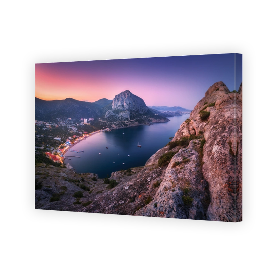 Night colorful mountain landscape. View from the mountain peak
