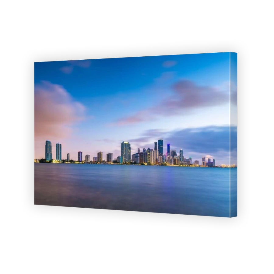 Miami, Florida, USA downtown skyline from across the Biscayne Bay at twilight.