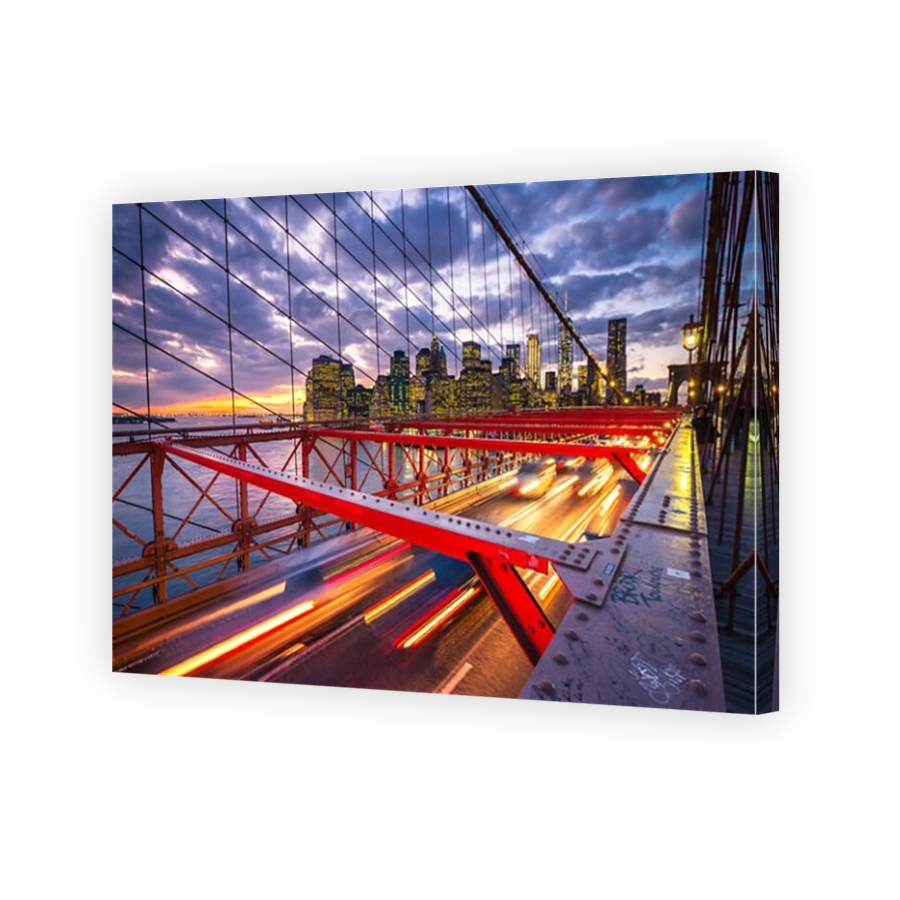 Brooklyn Bridge traffic at sunset, New York City, America