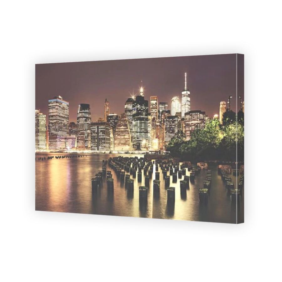 Vintage toned picture of Manhattan at night, New York, USA.
