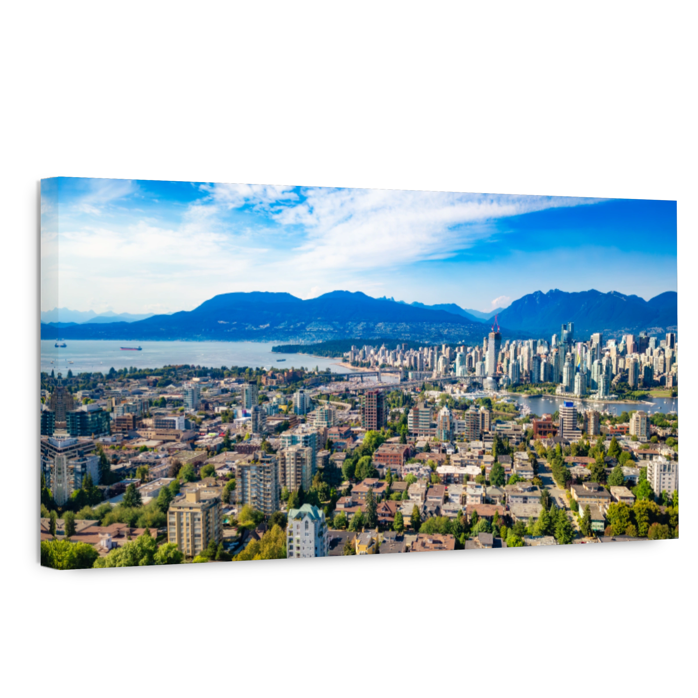Aerial view of Vancouver with majestic mountains in the background. BC, Canada