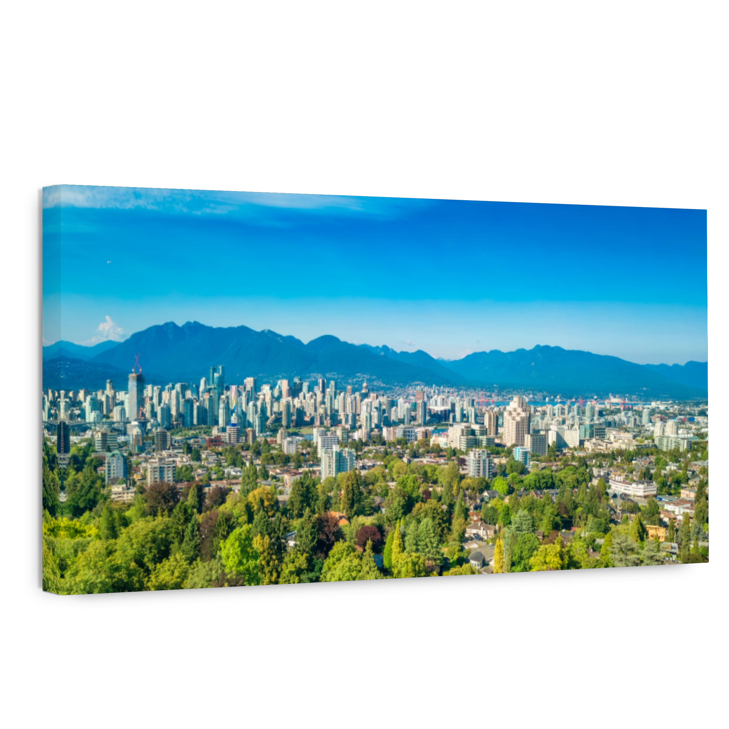 Aerial view of the skyline of Vancouver under a clear blue sky.
