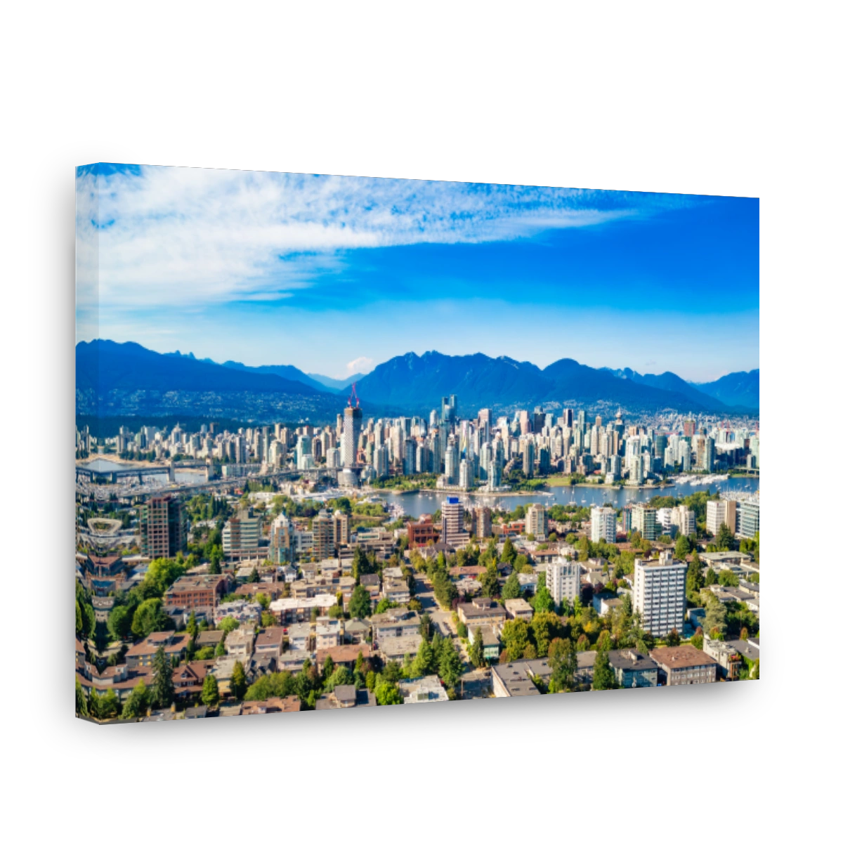 Aerial view of the skyline of Vancouver under a clear blue sky.