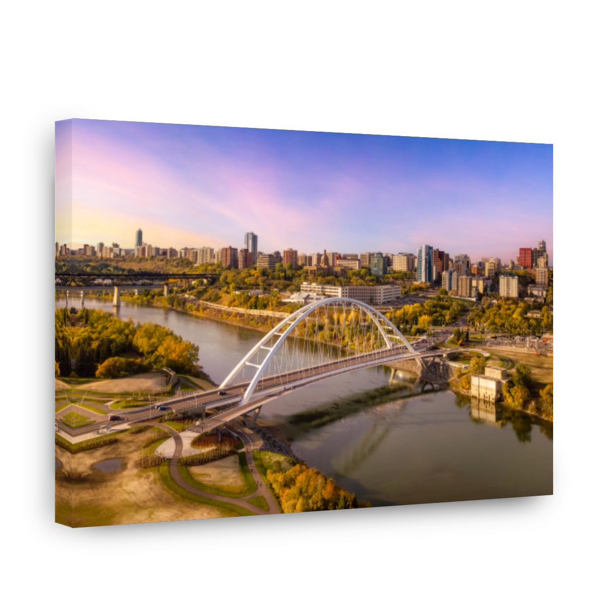 Aerial of a bridge over the river with the city in the background in Edmonton, Alberta, Canada.