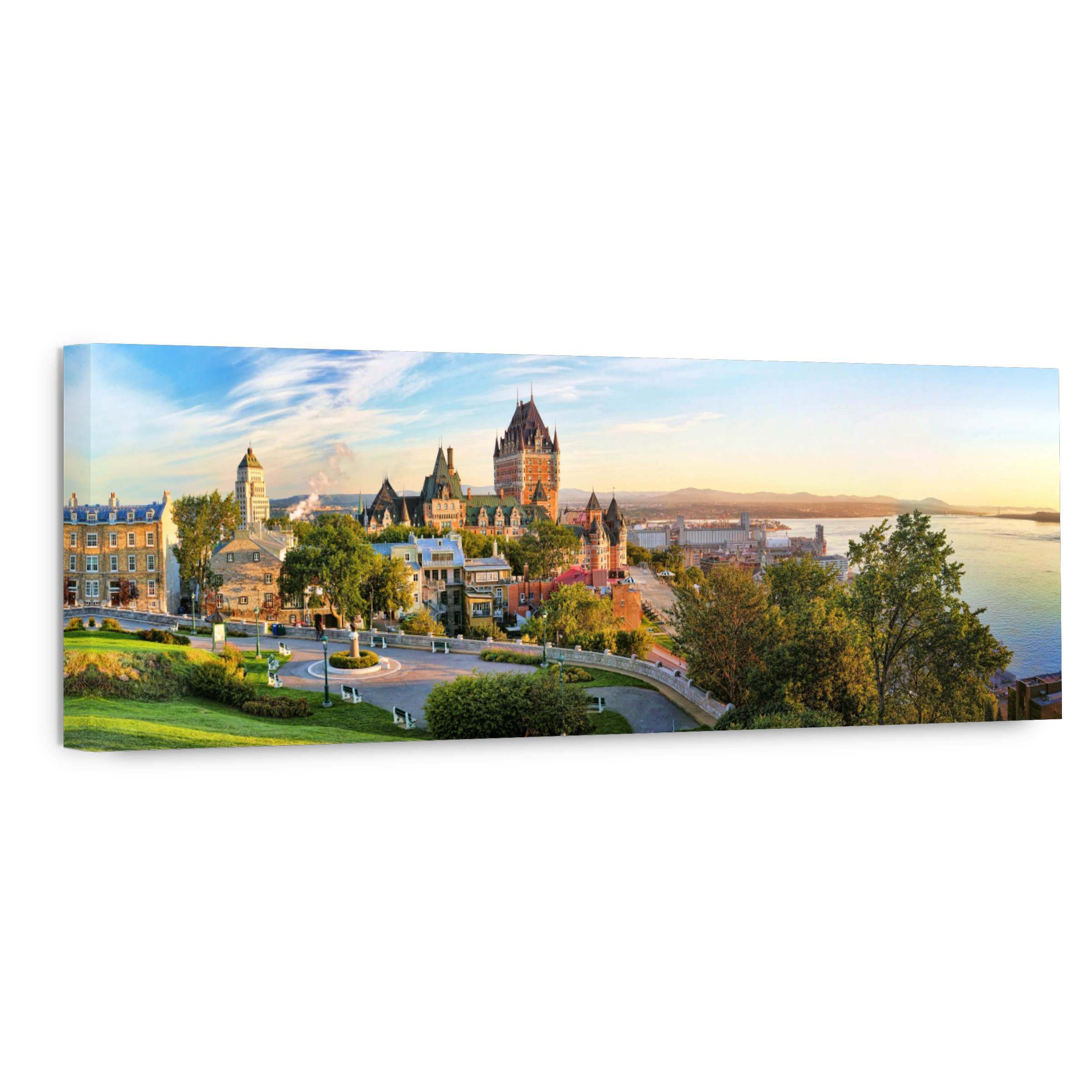 Panoramic view of Chateau Frontenac surrounded by greenery in Old Quebec, Canada at sunrise