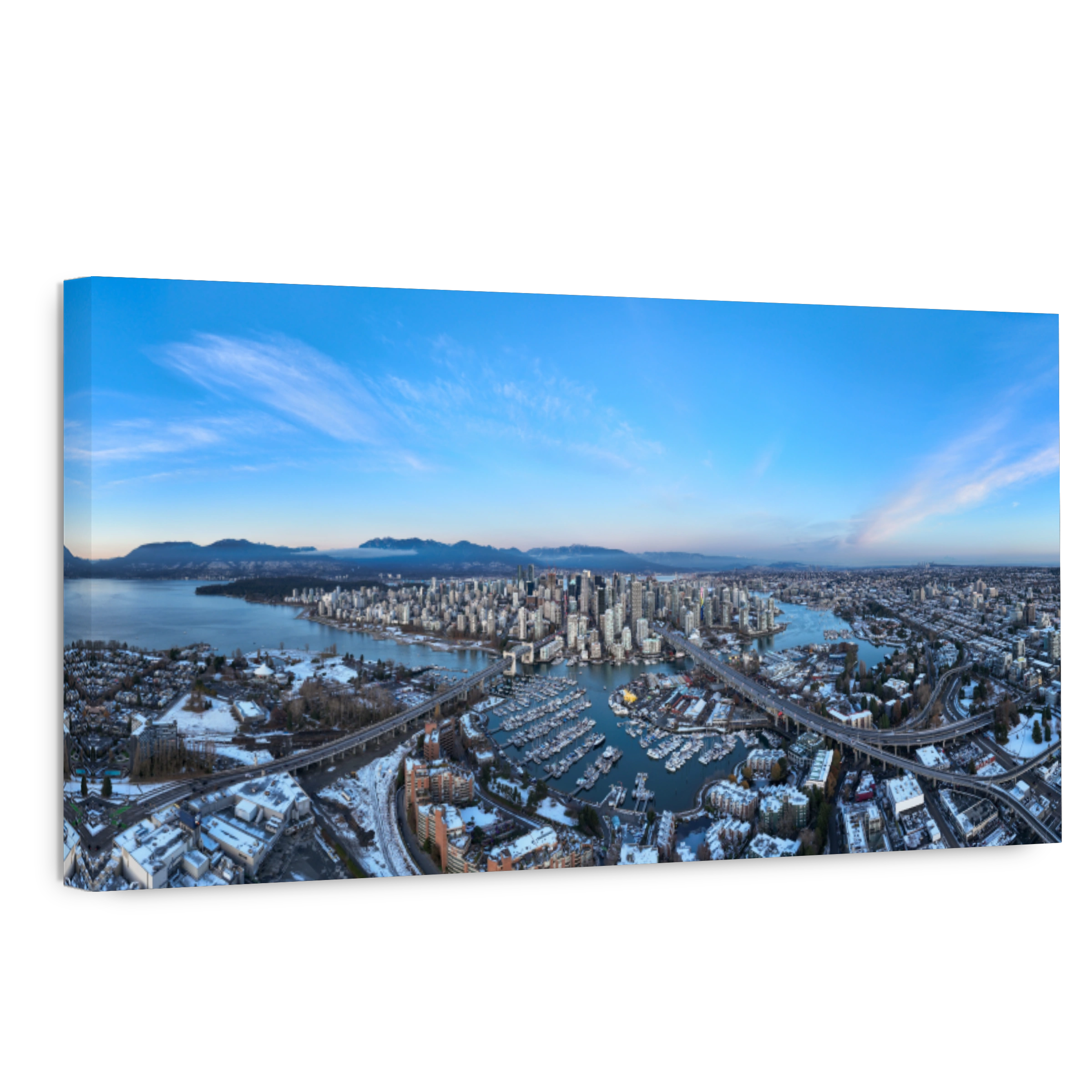 Panoramic shot of the beautiful Vancouver city in Canada with many skyscrapers during the winter