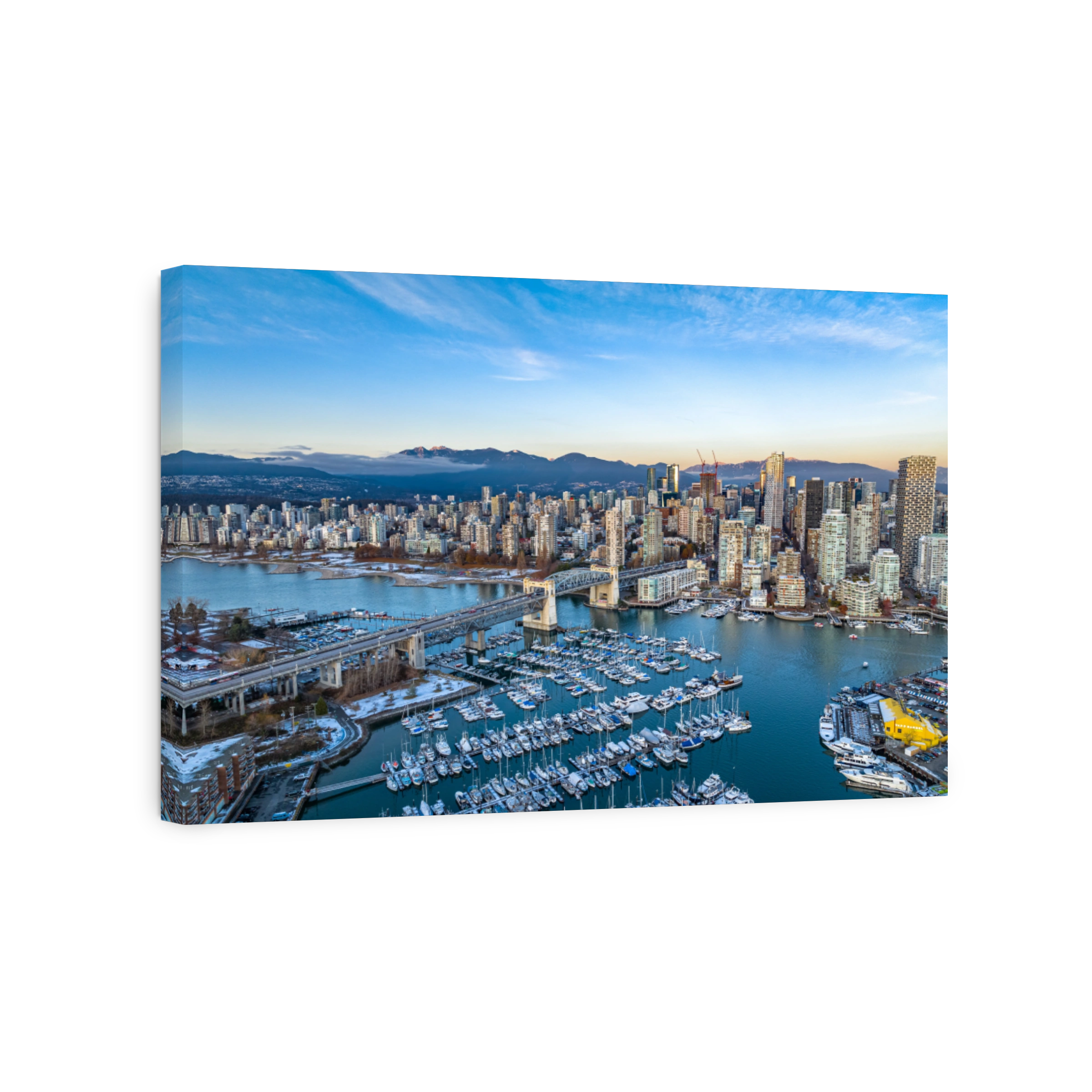 Aerial shot of the beautiful Vancouver city in Canada with many skyscrapers during the winter