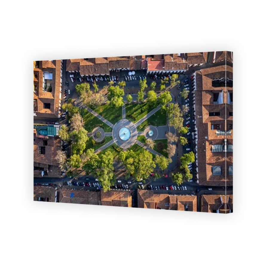 Vasco de Quiroga Plaza, also known as Plaza Grande, surrounded by tiled rooved buildings in Patzcuaro, Michoacan, Mexico.