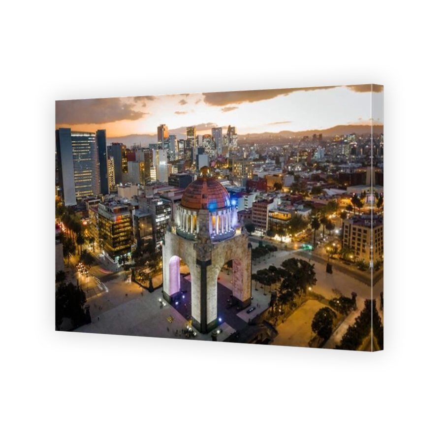 Aerial view of cityscape including architectural landmark Monument to the Revolution located at Republic Square in Mexico City, Mexico.
