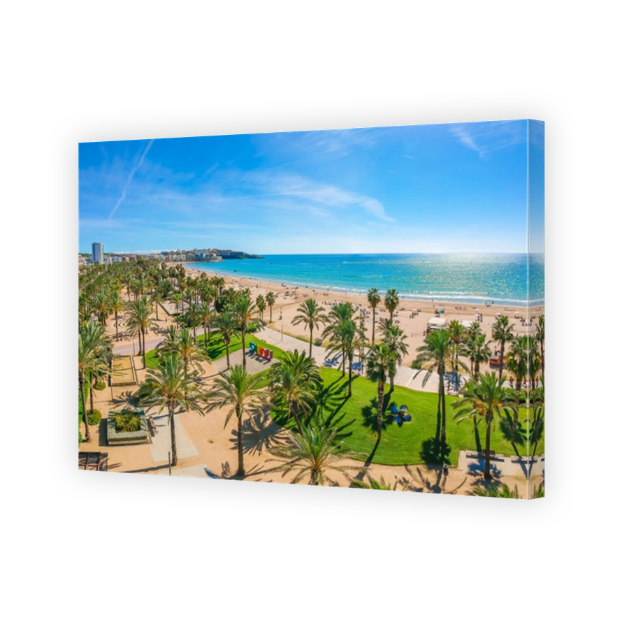 Beach, blue sea and palm trees in Salou city, Catalonia, Spain, Europe
