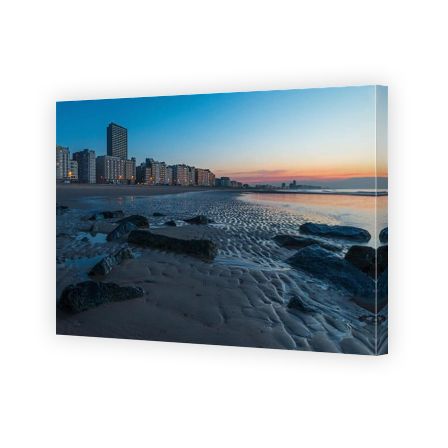 Cityscape of Ostend city at sunset with its North Sea beach, West Flanders, Belgium.