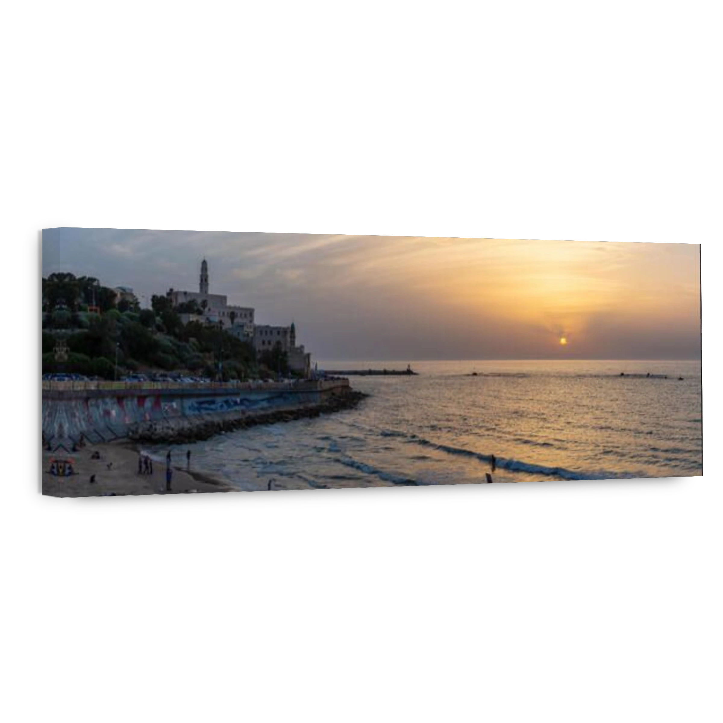 Tel Aviv, Israel - April 3, 2019: Beautiful panoramic view of a beach in the Old Port of Jaffa during a sunny and colorful sunset.