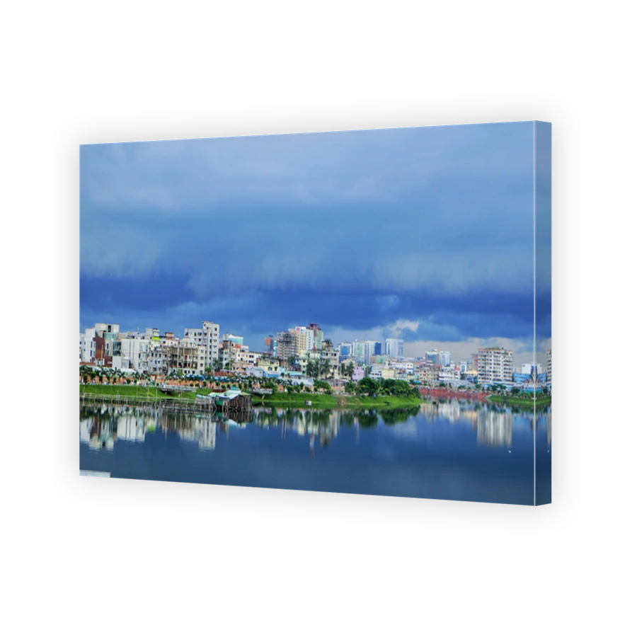 Panoramic View Of City By River Against Sky