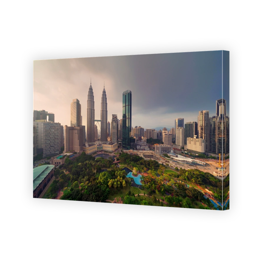 Aerial view of Kuala Lumpur Downtown, Malaysia. Financial district and business centers in smart urban city in Asia. Skyscraper and high-rise buildings at sunset.