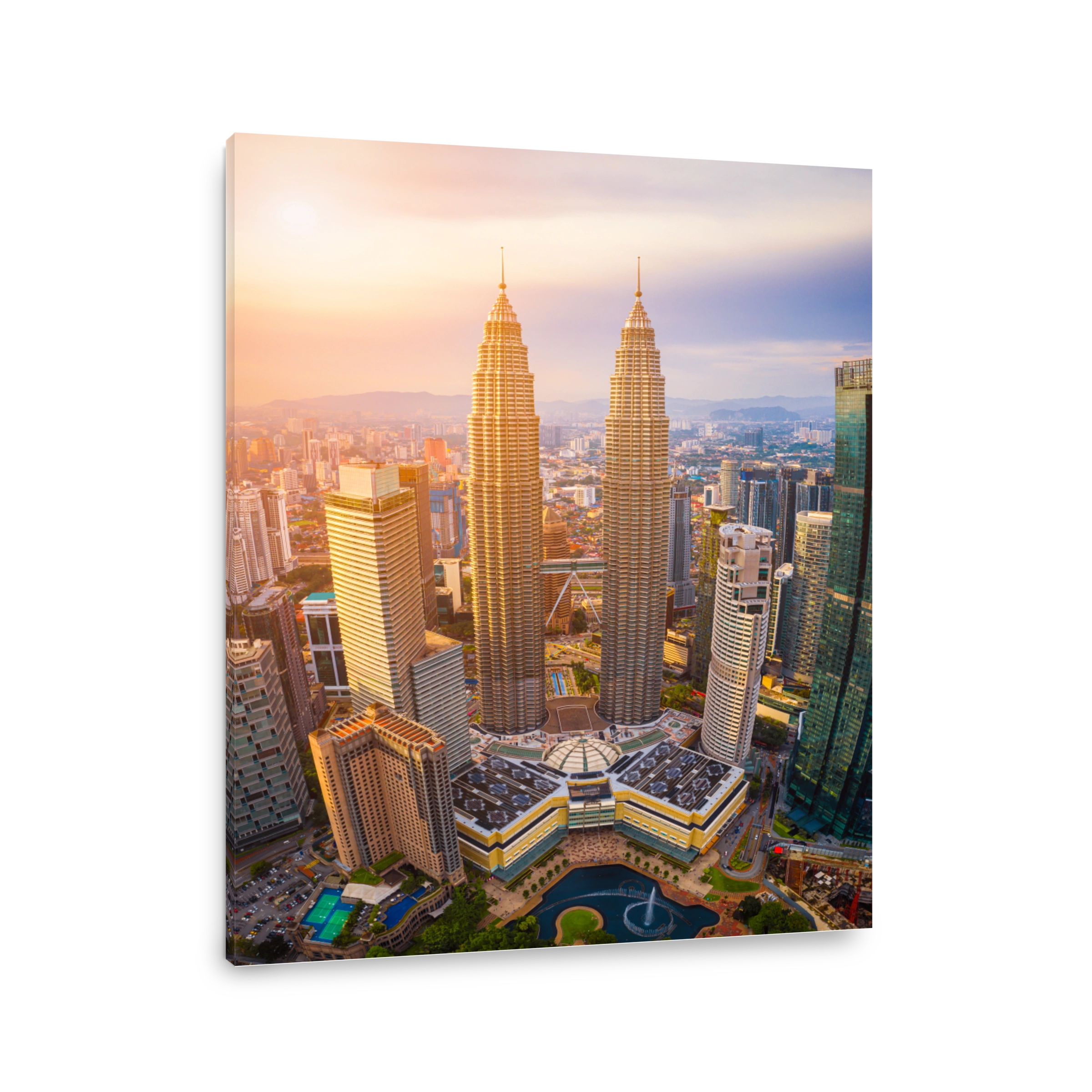Aerial view of Kuala Lumpur city skyline at sunset in Kuala Lumpur, Malaysia.