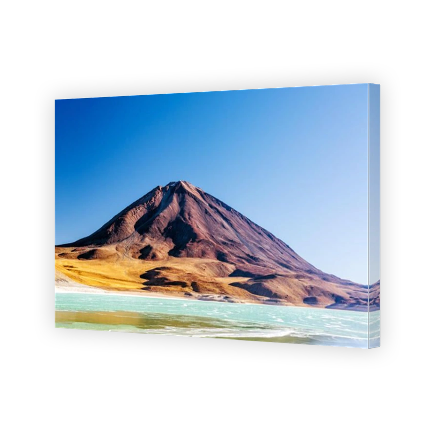 View of Licancabur Volcano and the emerald green Laguna Verde on the border of Chile and Bolivia