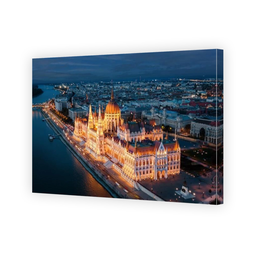 Aerial view of architectural landmark Hungarian Parliament building at dusk in Budapest, Hungary.