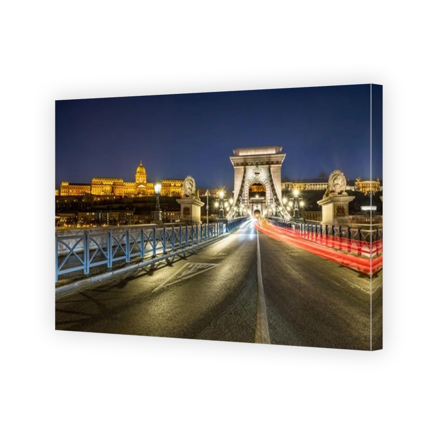 Buda Castle and the Chain Bridge traffic illuminated at the blue hour. Photo taken on 24th January 2025 in Budapest, Hungary.