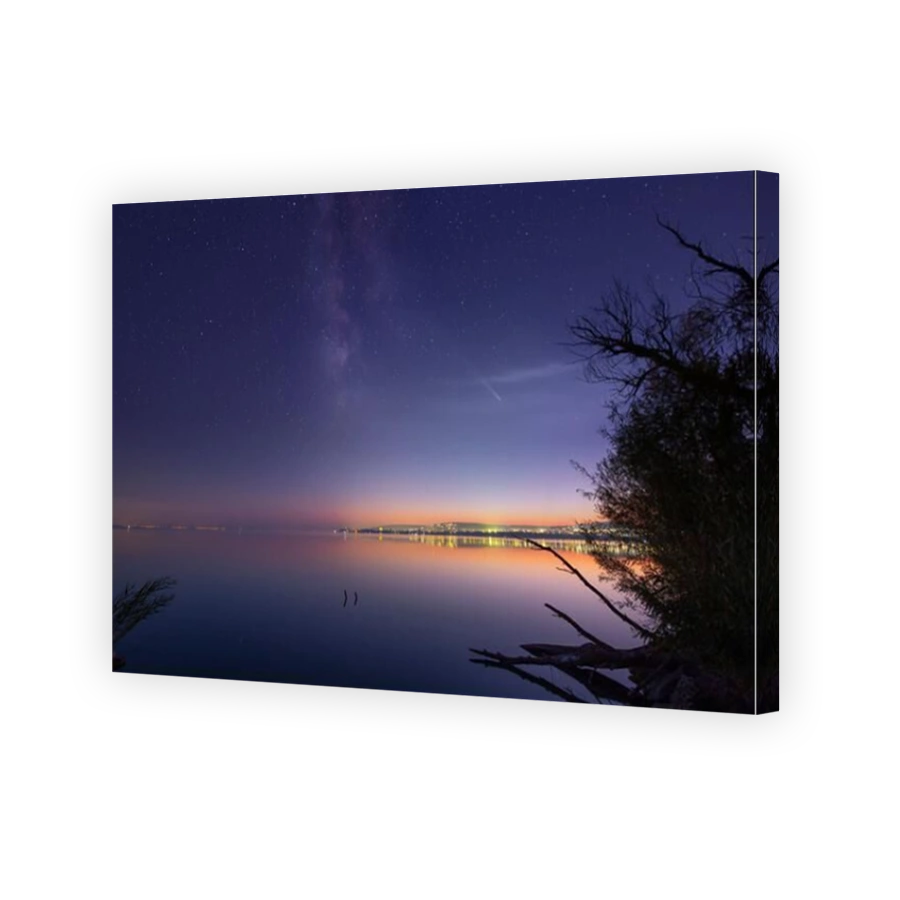 Comet C/2023 A3 (Tsuchinshan-ATLAS) over Lake Balaton, Hungary.