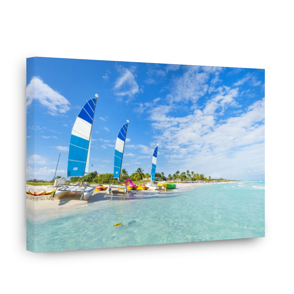Beautiful seascape with clear turquoise water. sailing ships are parked on the sand. beautiful beach of Varadero in Cuba on a sunny summer day