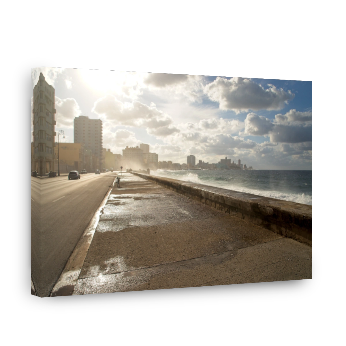 Sunny day at Malecon, Havana with road and quay under fluffy clouds
