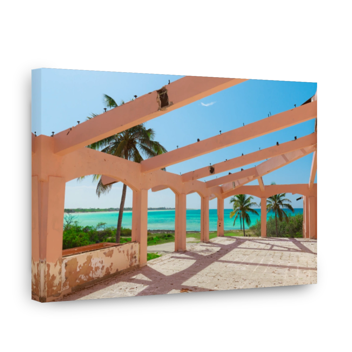 retro stylish abandoned pink building carcass near the beach