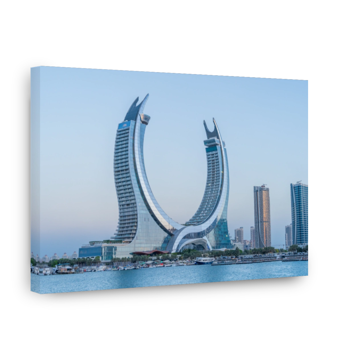 the newly developed lusail city with winter wonderland and crescent tower in the background.