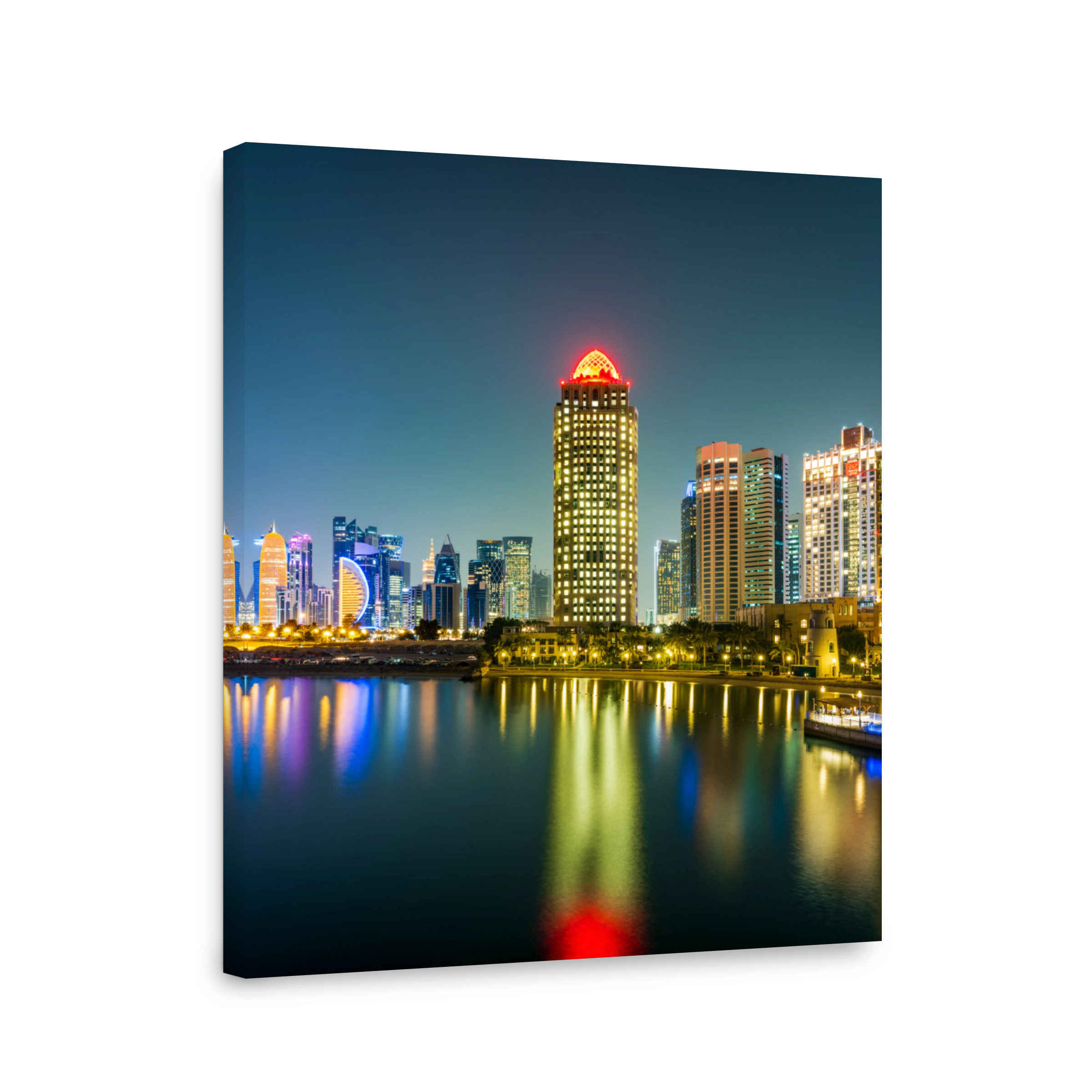 Vertical shot of Doha city illuminated with colorful lights, Doha, Qatar
