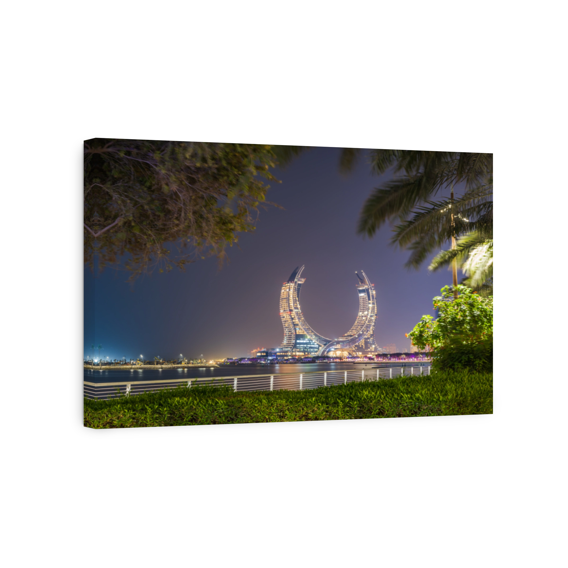 Lusail beachfront park modern buildings at night in Doha, Qatar