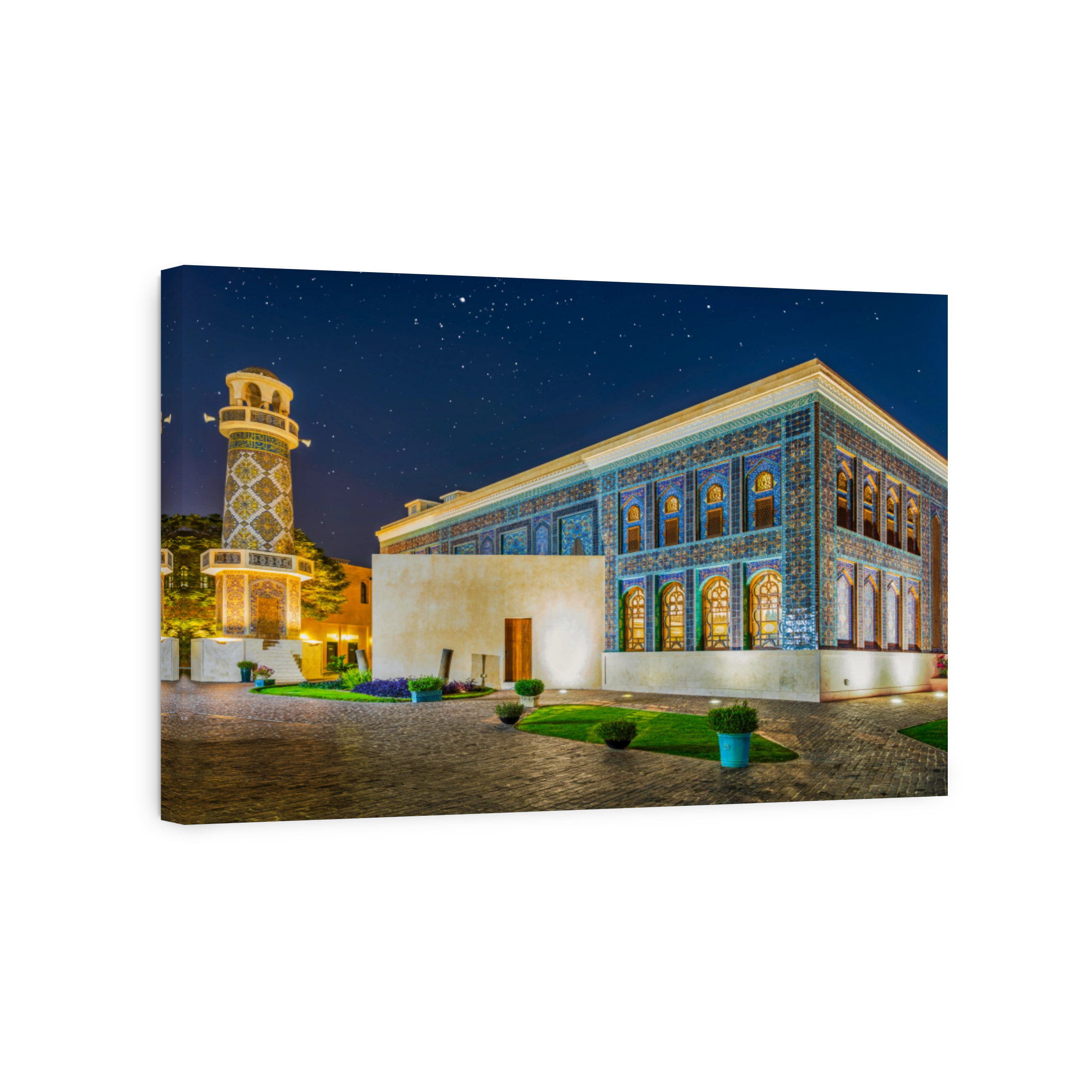 Village mosque illuminated with stars in the sky at night in katara village, Doha, Qatar