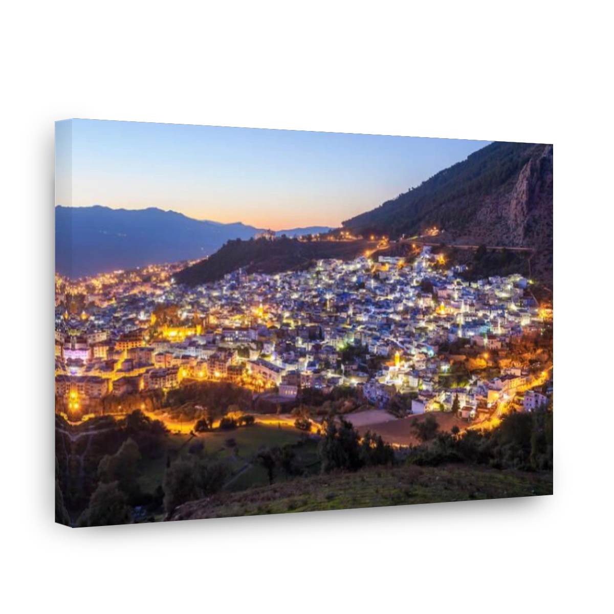 Chefchaouen aerial panoramic view at night. Chefchaouen is a city in northwest Morocco. Chefchaouen is noted for its buildings in shades of blue.