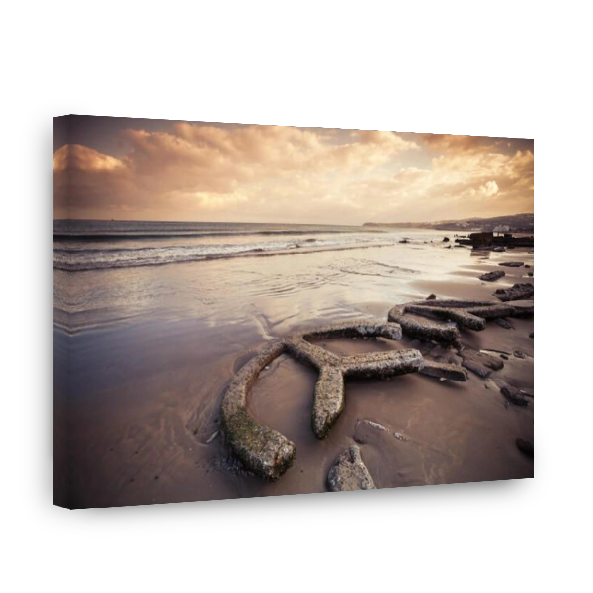 Atlantic ocean coast, old broken concrete construction lays on wet sand , Tangier, Morocco. Warm tonal correction photo filter e