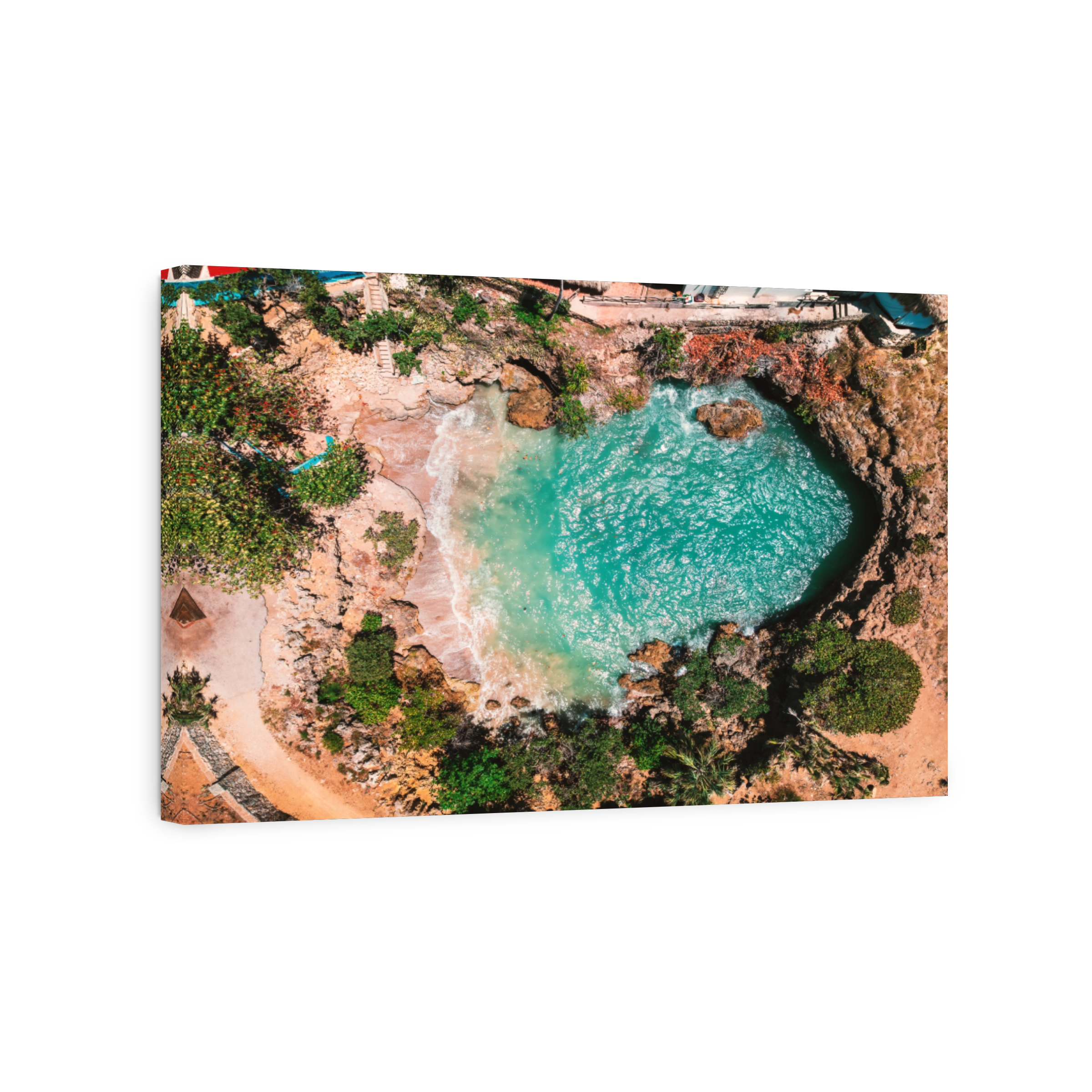 Ocean Waves Crashing Against Rocky Cliffs Along a Coastal Beach, Caribbean sea shoreline