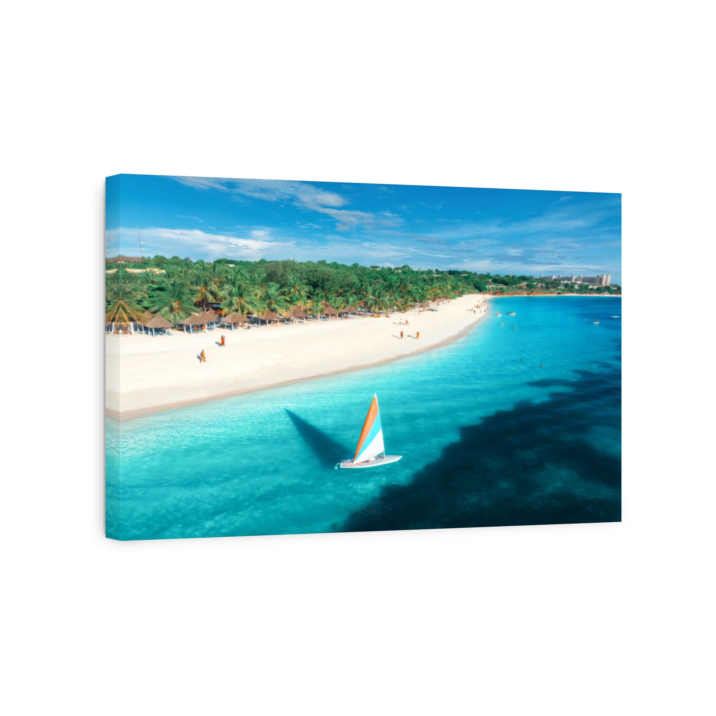 Aerial view of the sailboat on blue sea, white sandy beach at sunset. Summer vacation in Kendwa, Zanzibar. Tropical landscape with boat, yacht, ocean with clear water, green palms, sky. Top drone view