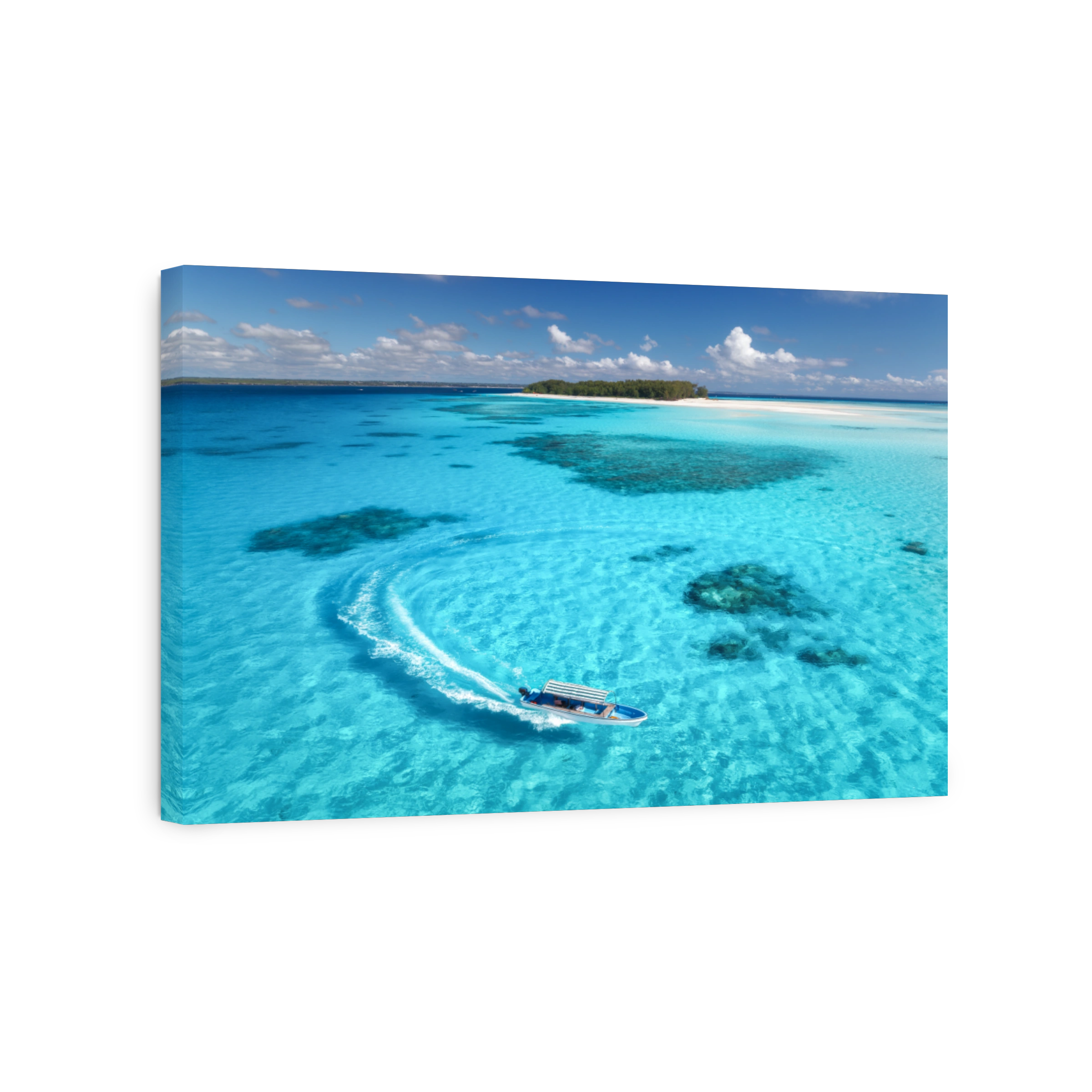 Aerial view of floating boat in transparent azure water on sunny summer day. Mnemba island, Zanzibar. Top view of yacht, sandbank in low tide, clear blue sea, sand, sky with clouds. Motorboat in ocean