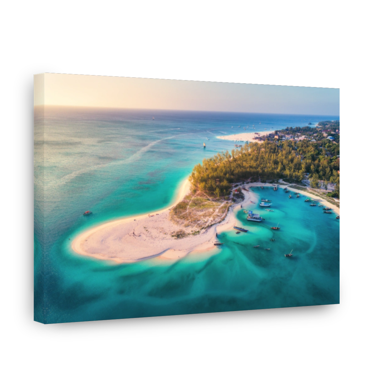 Aerial view of the fishing boats on tropical sea coast with sandy beach at sunset. Summer holiday on Indian Ocean, Zanzibar, Africa. Landscape with boat, green trees, transparent blue water. Top view