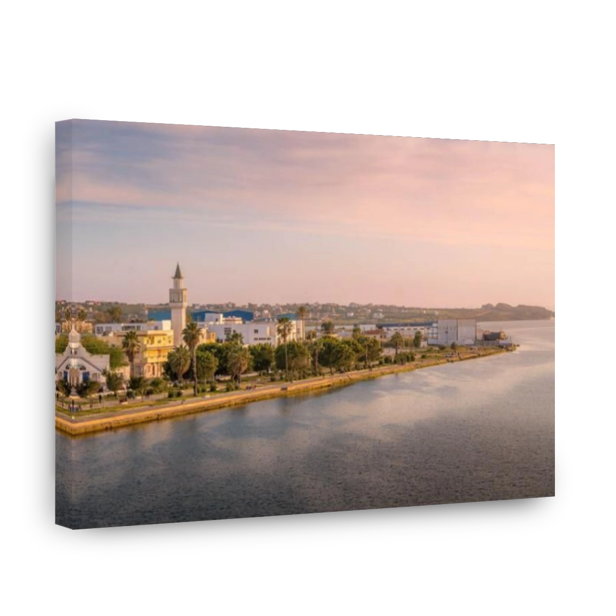 The scenic panorama of Bizerte, the city in Tunisia, with the Mediterranean sea, mosque minaret, and people on the waterfront.