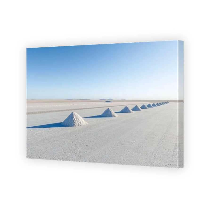 Salt mining in Colchani with salt pyramids ready for harvest, Uyuni salt flat (Salar de Uyuni), Bolivia, South America.