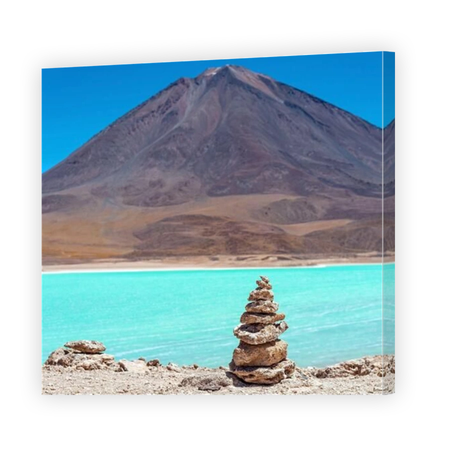 Wish pyramid by the Laguna Verde (Green Lagoon) and Licancabur volcano, Uyuni, Bolivia.