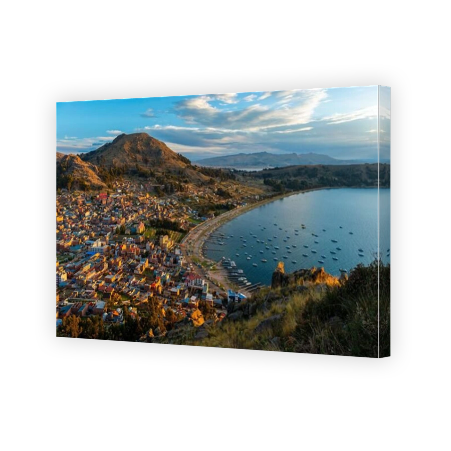 Aerial cityscape of Copacabana city at sunset by the Titicaca Lake, Bolivia.
