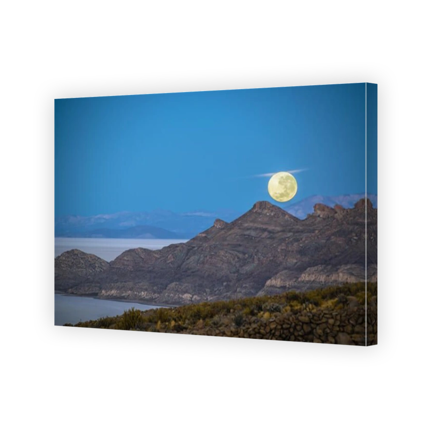 Moon setting in Bolivia over the Uyuni Salt Flats