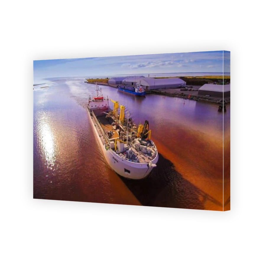The huge industrial ship in the sea travelling along the coastal harbor in Parnu Estonia