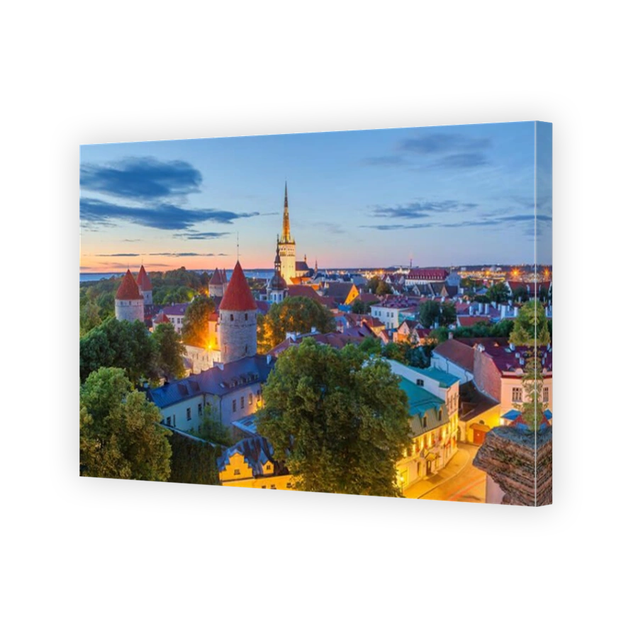 Magic white night view of old Tallinn with St. Olaf church. Illuminated medieval buildings, wall, towers and red roofs.