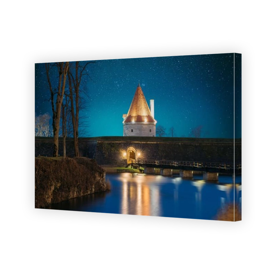 Kuressaare, Saaremaa Island, Estonia. Episcopal Castle In Evening Blue Hour Night. Traditional Medieval Architecture, Famous Attraction Landmark. Old